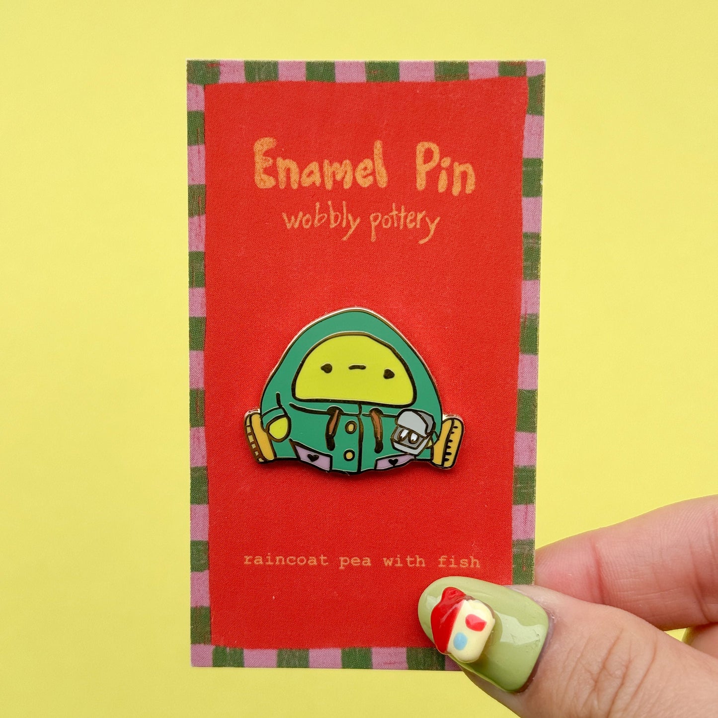 Enamel Pin - Raincoat Pea with Fish