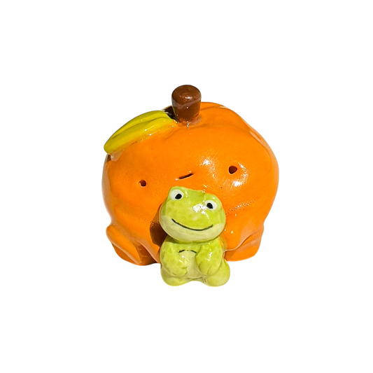 Orange with frog stuffy