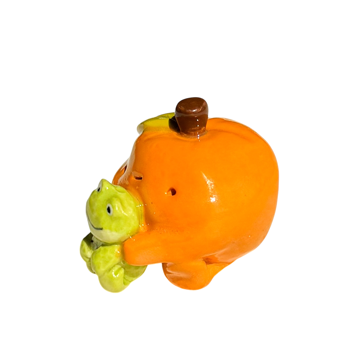Orange with frog stuffy