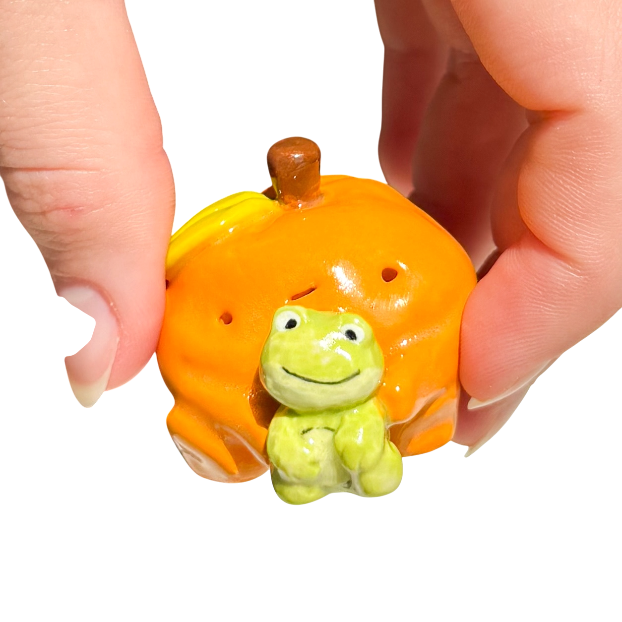 Orange with frog stuffy