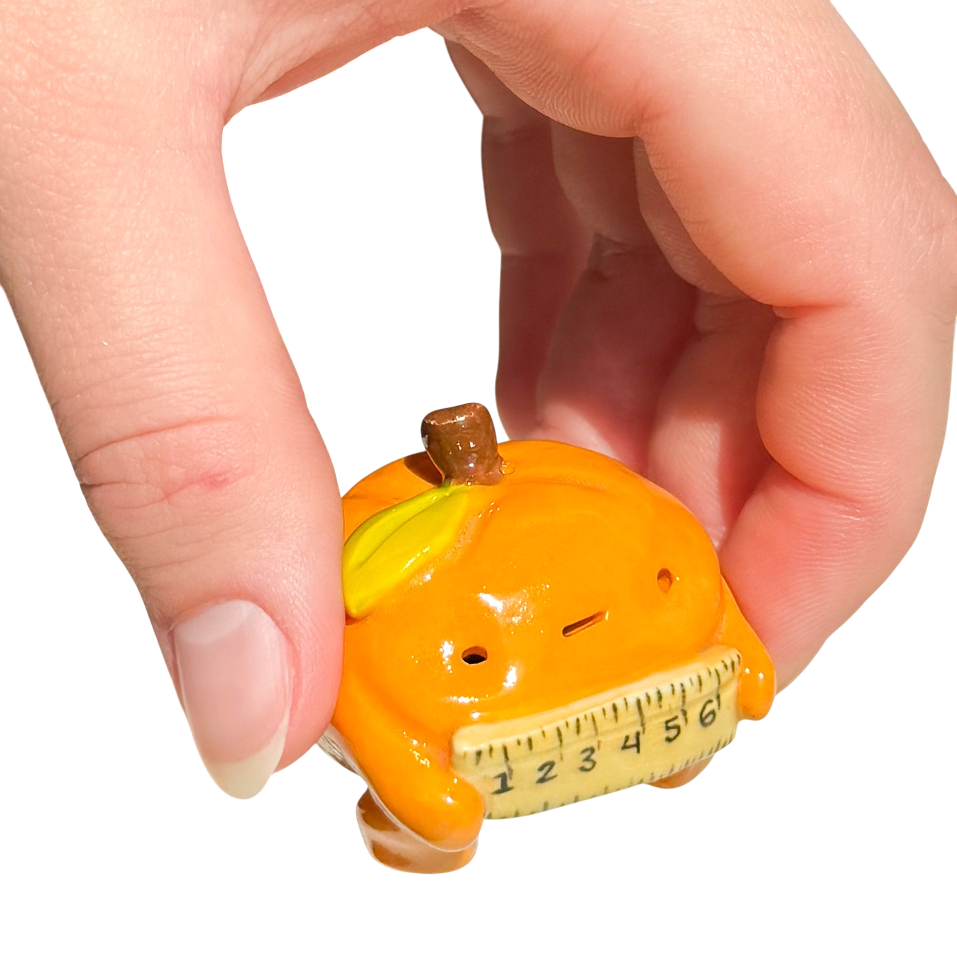 Orange with ruler