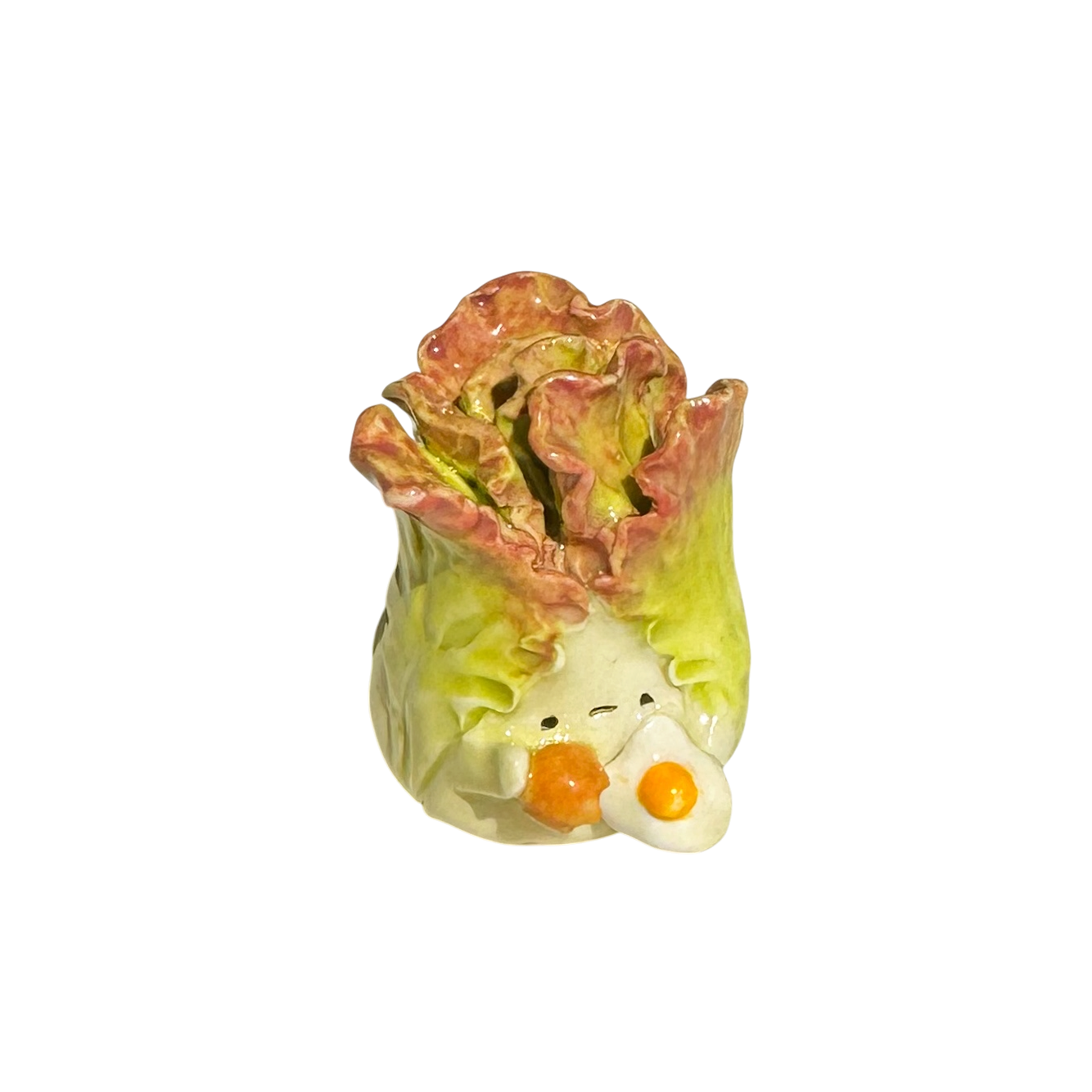 Lettuce with cracked egg