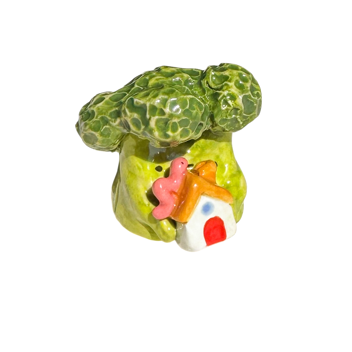 Broccoli holding house with worm
