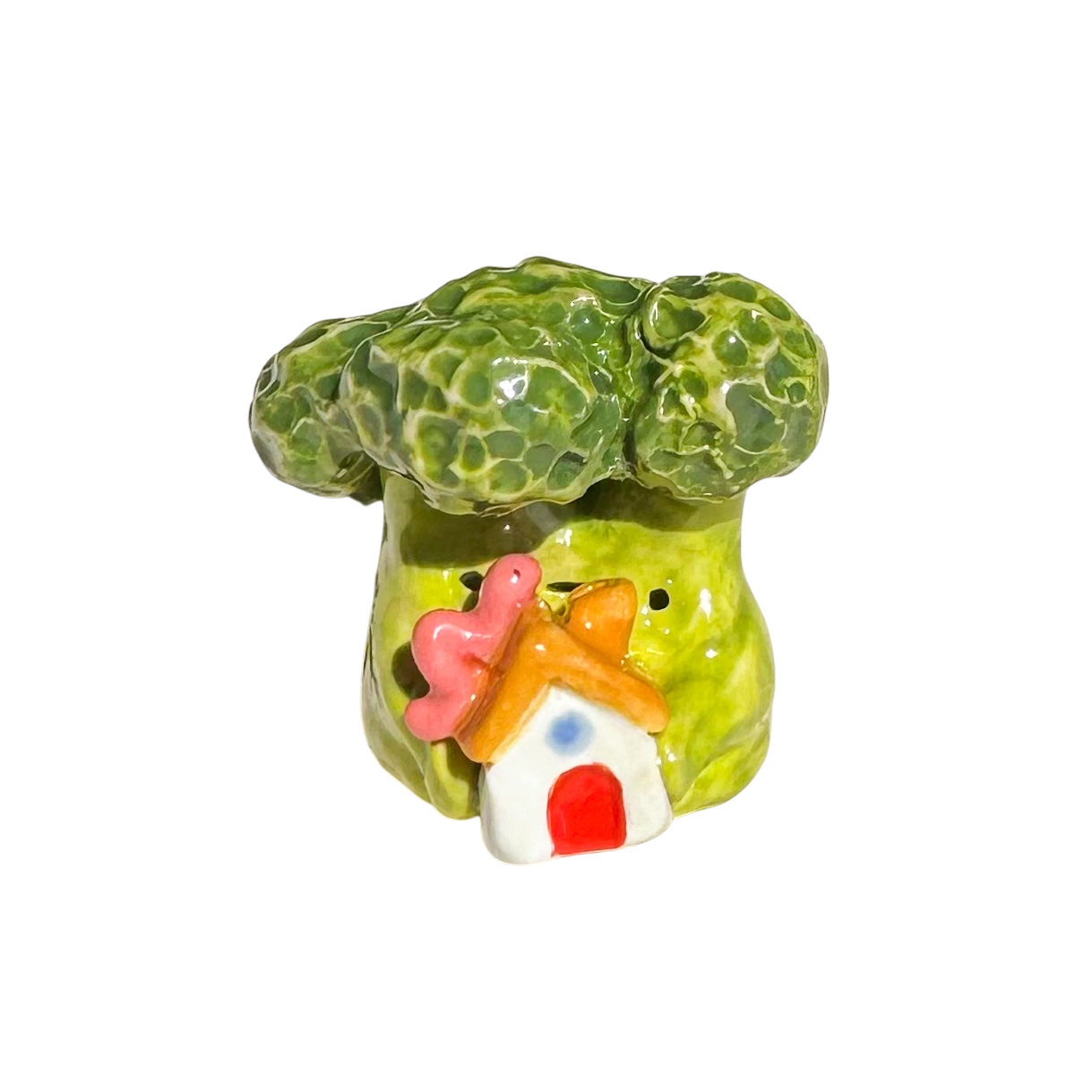 Broccoli holding house with worm
