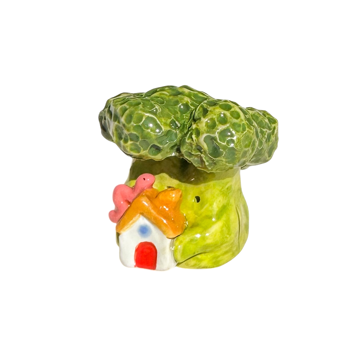 Broccoli holding house with worm
