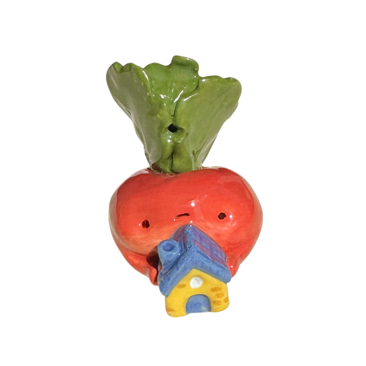 Radish with little blue house